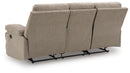 Side-Swipe Reclining Sofa with Drop Down Table
